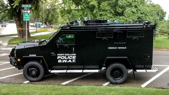 SWAT at 4th of July. I love the "rescue vehicle" on the side.  I feel safer already.